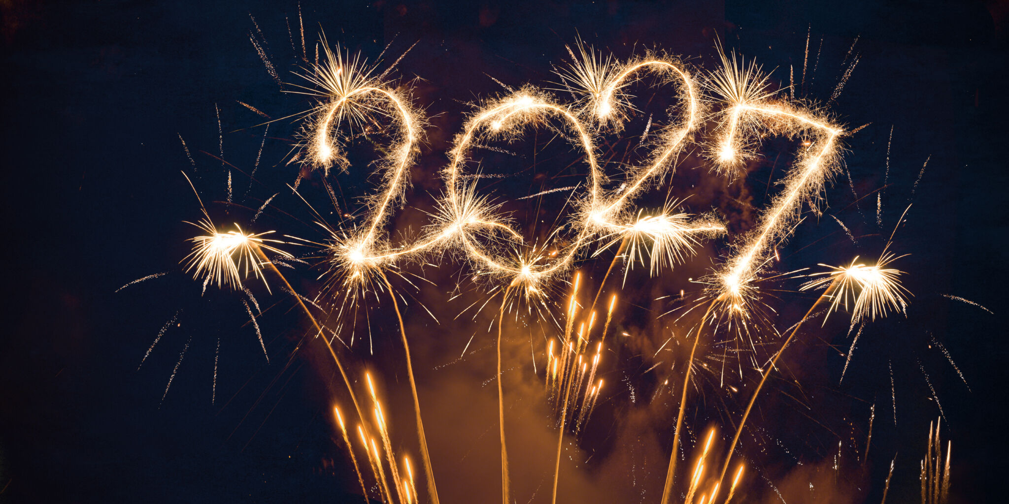 happy new year, new year's eve, silvester, new years eve, sparklers celebration greeting card, new year card - Year 2027 in sparkler font and firework fireworks pyrotechnic, blue night sky background